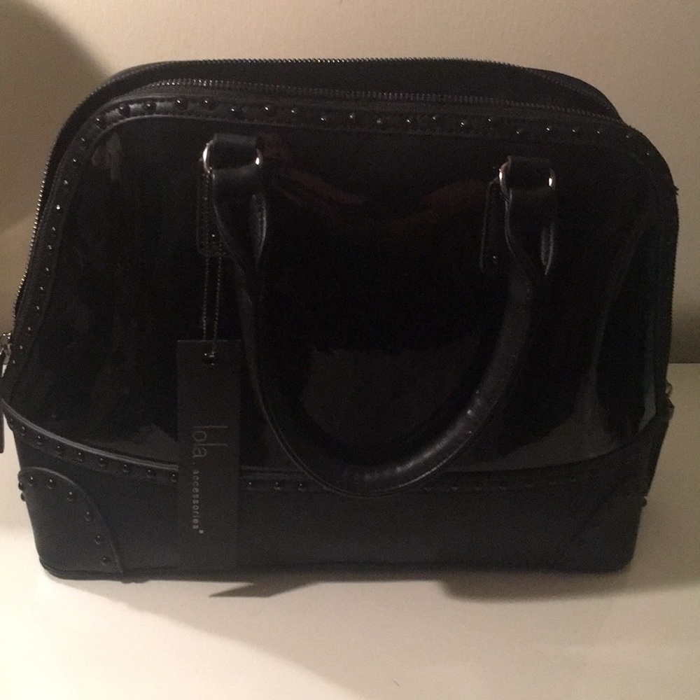 Lola patent leather satchel.